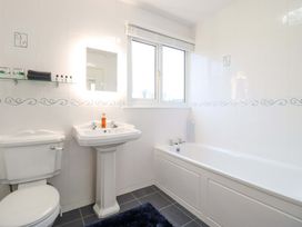 A bathroom with a sink, toilet, and bathtub at Bryn Y Garreg - The Wireless Free Farm (No Tech!) Y Trallwng