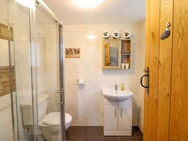 A bathroom with a shower, toilet, and sink at Bryn Y Garreg - The Wireless Free Farm (No Tech!) Y Trallwng