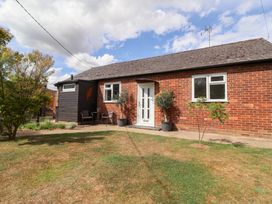 An exterior view of a house with plants in the garden at The Corner House Ufford near Woodbridge