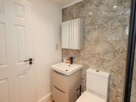A bathroom with a sink and toilet at Lakeside Lodge near Bowland Lakes Leisure Village