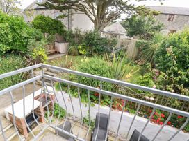 A garden view from a balcony at Rosemaddon in Crantock