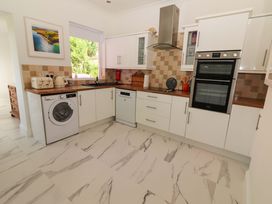 A kitchen with appliances and countertops at Rosemont in Adare
