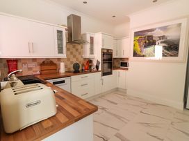 A kitchen with appliances and utensils at Rosemont in Adare