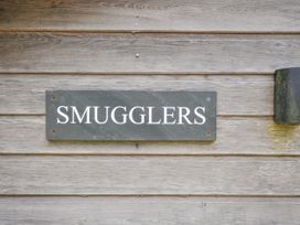 A sign reading SMUGGLERS at Smugglers, Bodmin Moor, St Breward near St Tudy