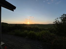 A view of the sunset over fields at Smugglers Bodmin Moor, St Breward near St Tudy