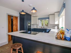A kitchen with a countertop and sink at Hoddell Pitch Cottage Kinnerton near New Radnor