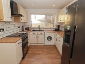 A kitchen with modern appliances at 41 St. James Street Narberth