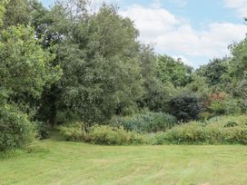 A natural landscape with trees and grass at Aunty Junes Cottage in Okehampton