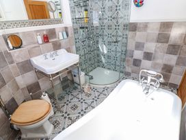 A bathroom with a sink and toilet at The Museum in Nenthead