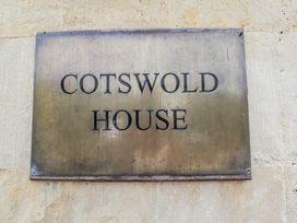 A nameplate that reads Cotswold House
