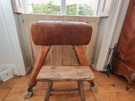 A gymnastics pommel horse in a living room at Cotswold House in Moreton-In-Marsh