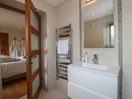 A bathroom with a sink and towel warmer at White House in Montgomery