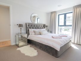 A bedroom with a bed and window at Apartment 8 in 