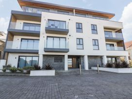 A building with balconies and windows at Beach View Fistral in Newquay