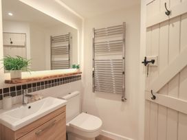 A bathroom with a sink and toilet at Daffodils in Ambleside
