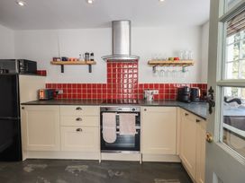 A kitchen with appliances and countertop at Daffodils in Ambleside