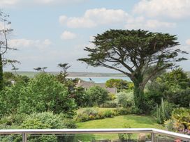 A view of trees and ocean at Bodare 8 Daymer Bay