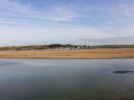 A view of water and sandy landscape at H2 Atlantic Bay Holiday Park Padstow