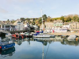 A harbor with boats and buildings at 161 Atlantic Bay Holiday Park, Padstow