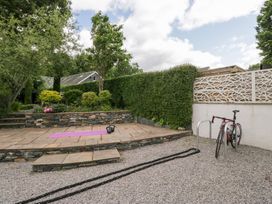 A garden with a yoga mat and exercise equipment at Sunnycroft in Keswick
