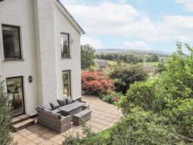 A patio with seating at Rowanhill in Kendal