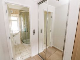 A bathroom with a shower and sink at Erisa