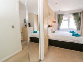 A bedroom with a bed and furniture at Erisa in Stepaside