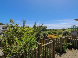 A deck area with plants and a view of the landscape at 2 Court Cottage Dartmouth