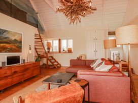 A living room with a sofa and coffee table at Roughtor Barn Poldue near Camelford