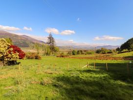 A landscape view with mountains and trees at Bramble Cottage Thornthwaite near Braithwaite
