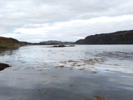 A body of water with hills in the background at Scarba, Balvicar, Isle Of Seil