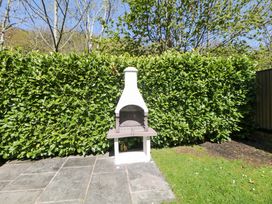 A chiminea in an outdoor area at Dovestone Luxury Lodges (sleeps 6) - pet free, Greenfield