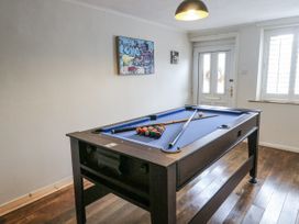 A game room with a pool table at Daisy Cottage in Wigton