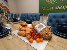 A table set with croissants and sourdough bread at 11 Rutland Street Filey
