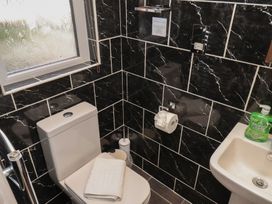 A bathroom with toilet and sink at 11 Rutland Street Filey