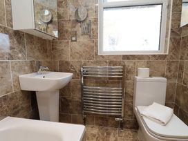 A bathroom with a sink and toilet at 11 Rutland Street in Filey