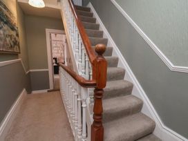 A staircase in a hallway at 11 Rutland Street Filey