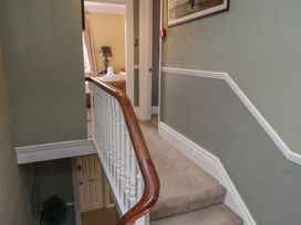 A staircase leading to a hallway at 11 Rutland Street Filey