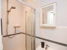 A bathroom with shower and sink at Falcon's Nest in Whitby