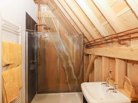 A bathroom with shower and sink at Pucklechurch in Kingsteignton