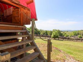 An outdoor area with stairs leading up at Pucklechurch in Kingsteignton