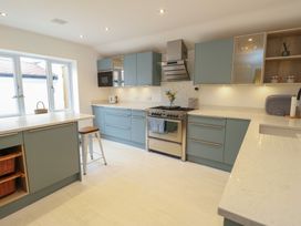 A kitchen with cabinets and appliances at Gorse Hill