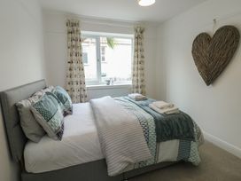 A bedroom with a bed and window at Gorse Hill