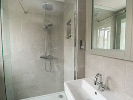 A bathroom with a shower and sink at Gorse Hill