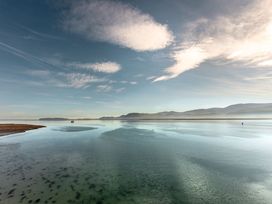 A view of the water and clouds at Gorse Hill Rhosneigr