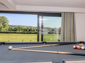 A game room with a pool table and view at Number 7 Bishop Sutton