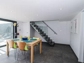 A dining room with a table and chairs at Number 7 Bishop Sutton