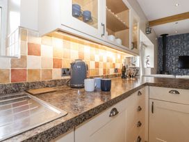 A kitchen with countertop and kitchenware at The Gatehouse