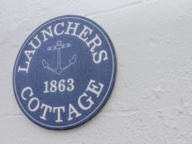 A sign for Launcher's Cottage dated 1863 in Scarborough