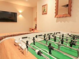 A foosball table in a game room at Eydon in Salcombe